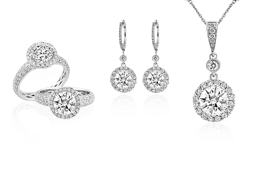 A sparkling diamond necklace, matching ring