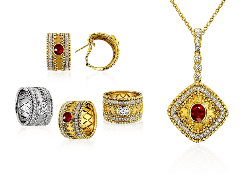 A collection of elegant jewelry featuring a prominent ruby stone