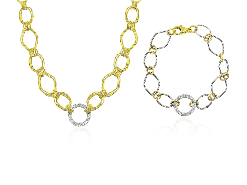 A gold and white diamond necklace paired with a matching bracelet